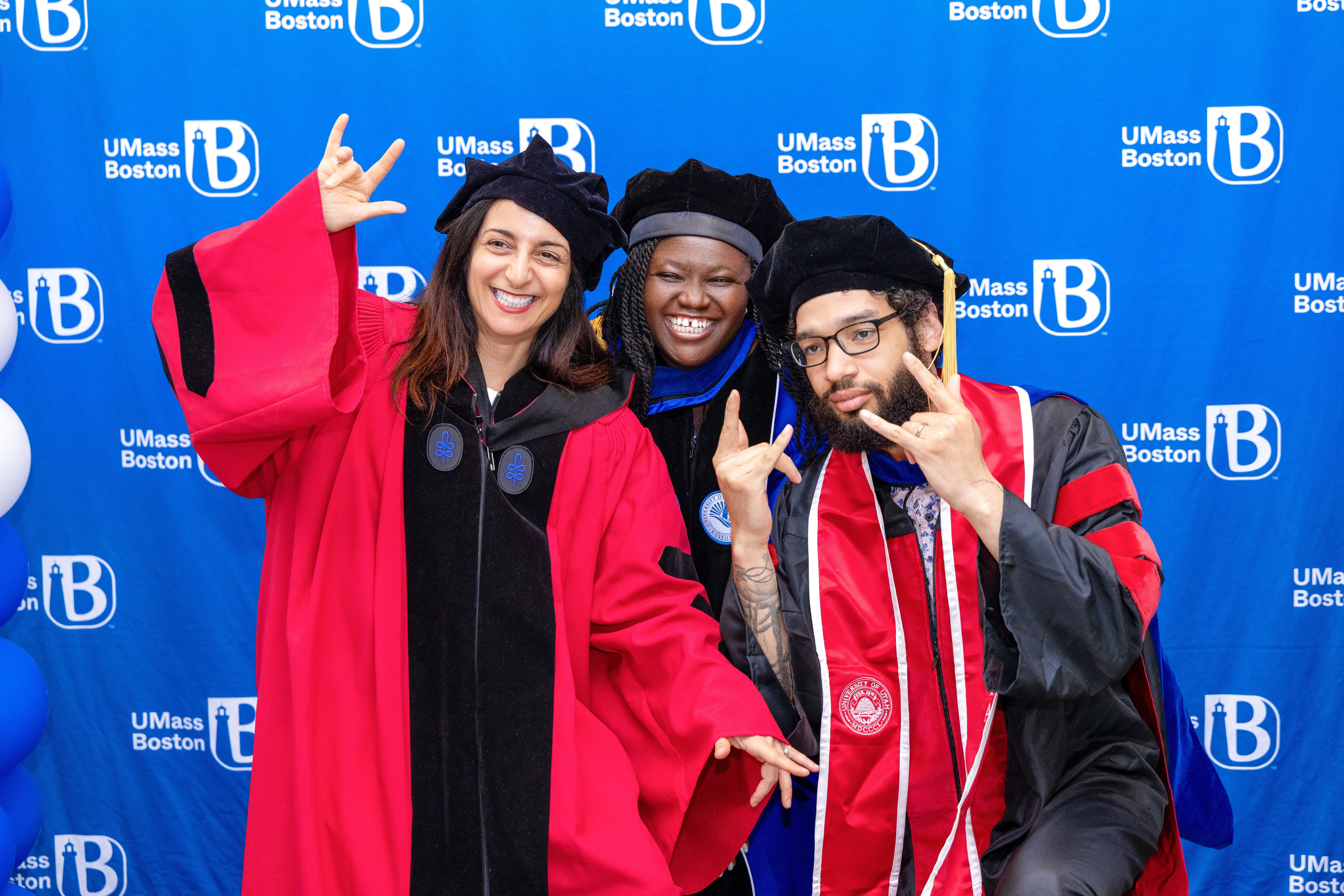 Dr. Patricia Tiimah Naya with Alessia Contu and Jared Poole at UMass Boston commencement